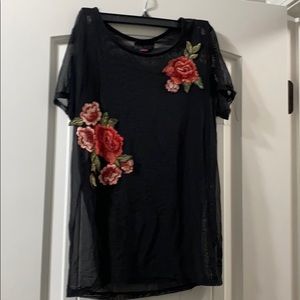 A black see through shirt